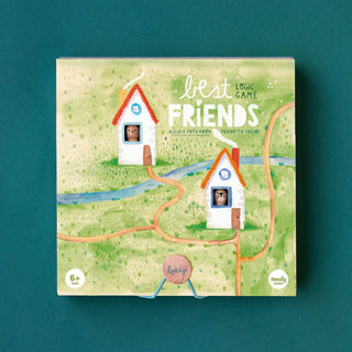 The board game box for 'Best Friends' Logic Game is shown against a solid teal background. The box features a whimsical illustration of two small houses on a green grassy landscape with winding orange paths and a blue river. The box has two cut-out windows where a wooden otter and rabbit are visible through the holes.