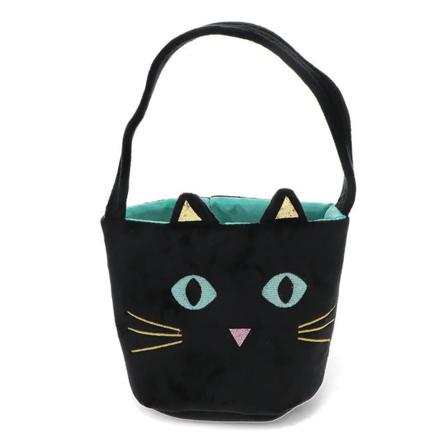 A black cat-shaped bucket bag with embroidered eyes, whiskers, a pink nose, and gold ear accents, featuring a teal interior and a black shoulder strap, shown on a plain white background.