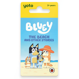 Bluey The Beach and Other Stories card book in its original yellow and blue hanging card packaging, featuring the Bluey characters on a sandy beach.